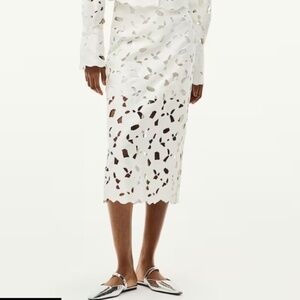 White SATIN SKIRT WITH EYELET EMBROIDERY